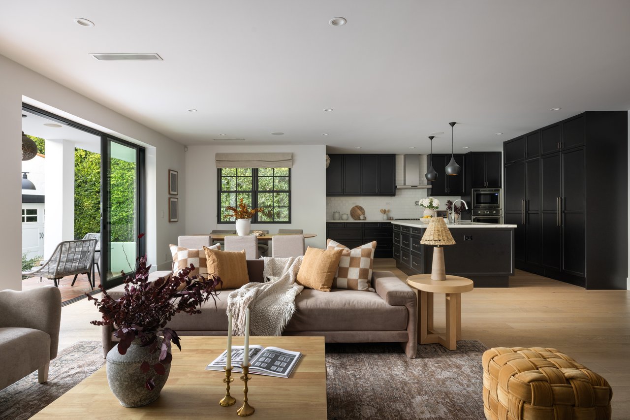 Open-plan residential interior with calm natural materials